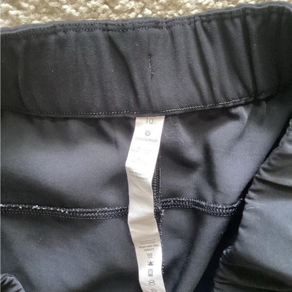 lululemon athletica Black On The Fly Pants 10 - Picture 2 of 5